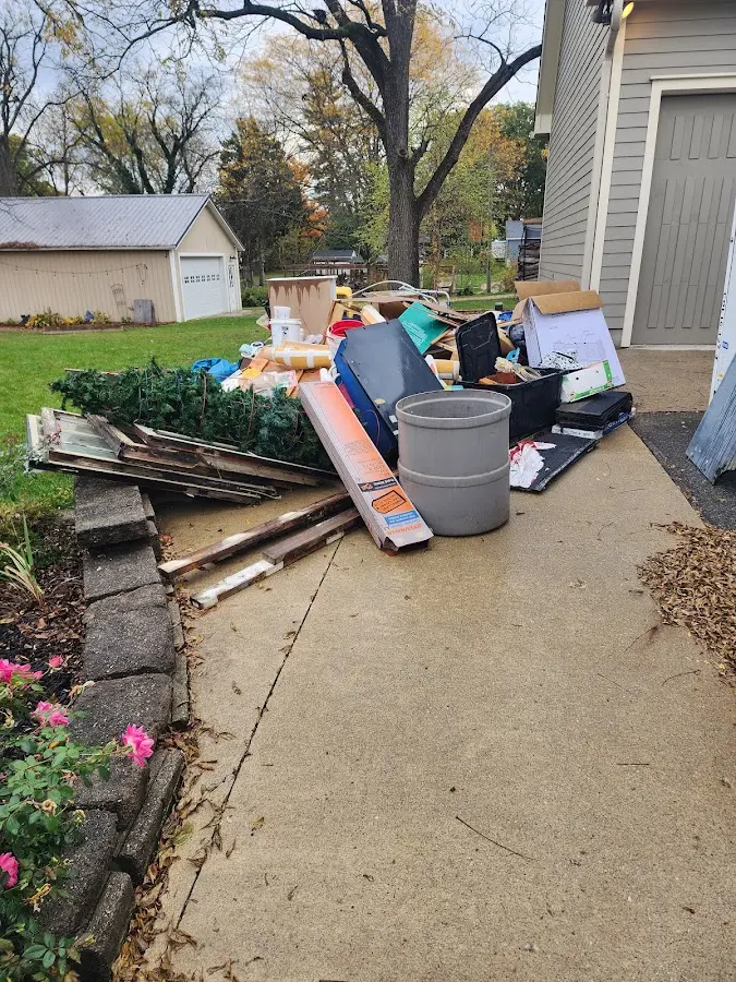 Dumpster being loaded with debris for 3 Yard Dumpster Rental in Jenkintown